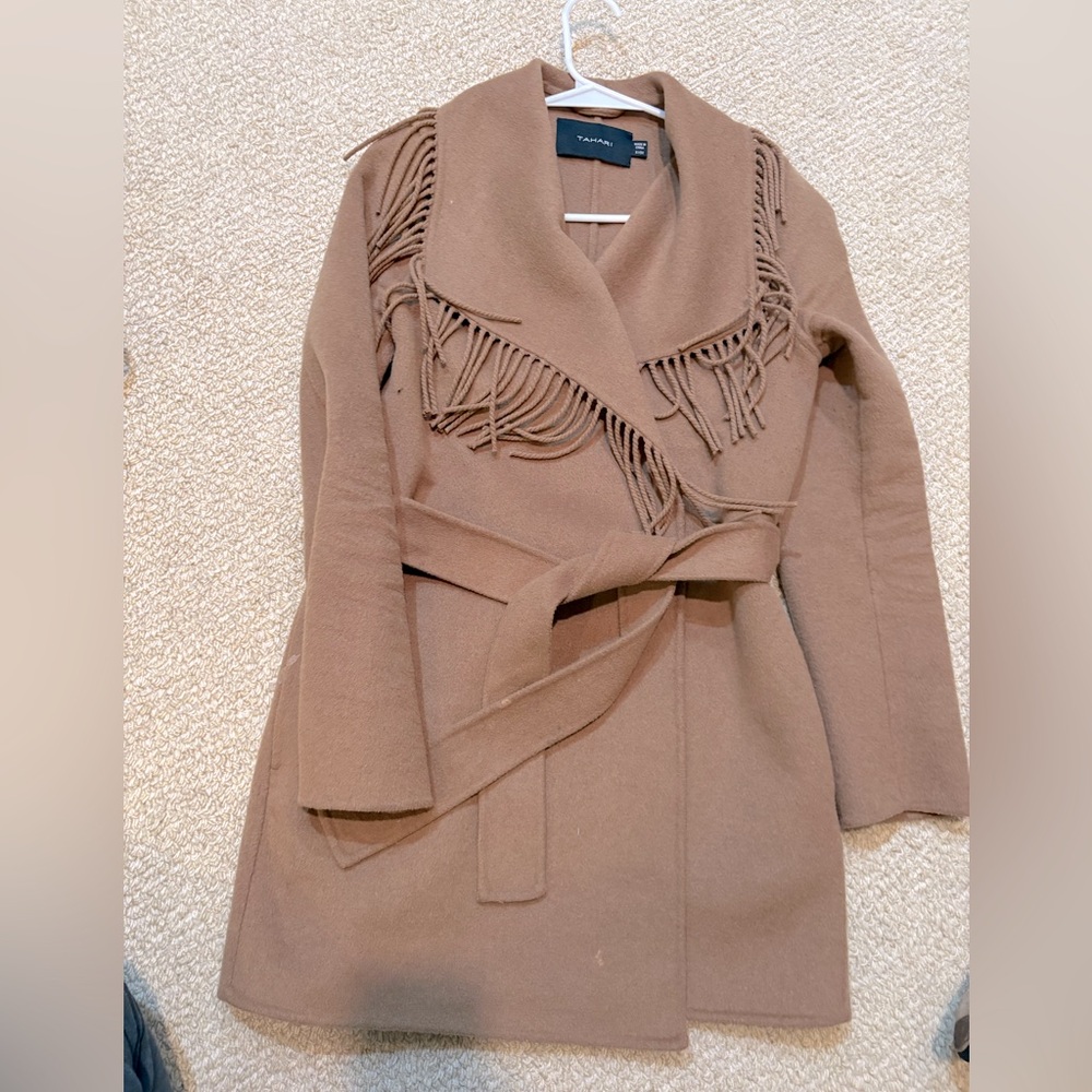 Women’s tahari coat with fringe collar in very good condition.